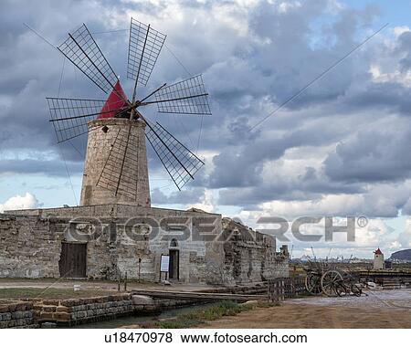 Windmills at Trapani saline pans, sunset, Sicily, Italy View Large Photo Image Stock Photo - Windmills at Trapani saline pans, sunset, Sicily, Italy. Fotosearch