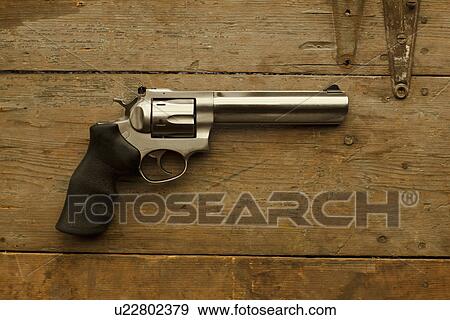 357 Caliber handgun on table View Large Photo Image Stock Photo - 357 Caliber handgun on table. Fotosearch