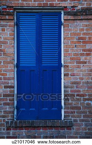 Stock Photograph - Blue window shutter, closed. Fotosearch