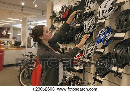 Business owner in bicycle store View Large Photo Image Stock Image - Business owner in bicycle store. Fotosearch