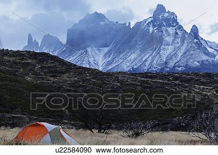 Stock Image - Camping in front of Cordillera del Paine. Fotosearch