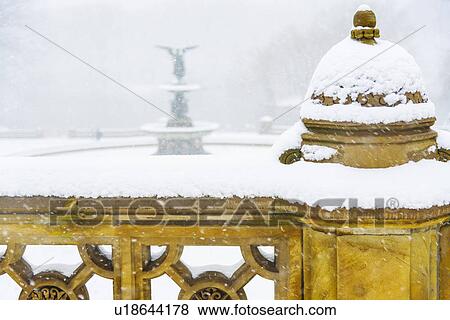Central Park, Bethesda Fountain covered with snow in winter View Large Photo Image Stock Photo - Central Park, Bethesda Fountain covered with snow in winter. Fotosearch