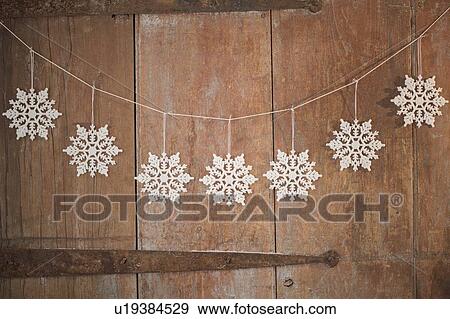 Stock Photo - Christmas ornaments on door. Fotosearch