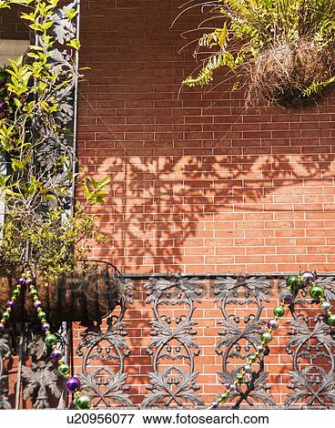 Stock Photo - Close up of balcony with potted plants. Fotosearch
