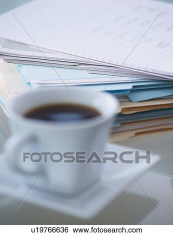 Close-up of coffee and paper material View Large Photo Image Stock Photograph - Close-up of coffee and paper material . Fotosearch