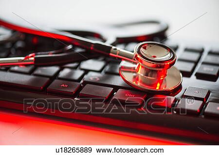 Close up of computer keyboard and stethoscope, studio shot View Large Photo Image Stock Photo - Close up of computer keyboard and stethoscope, studio shot. Fotosearch