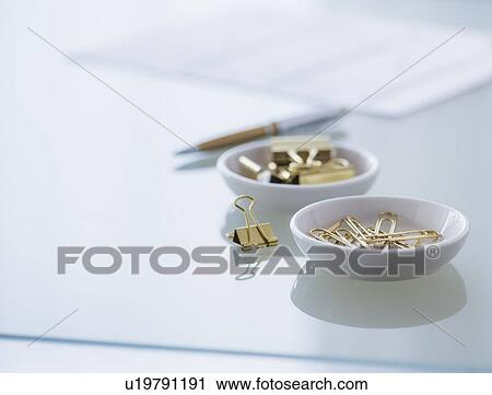 Close-up of paper clip and binder clip View Large Photo Image Stock Image - Close-up of paper clip and binder clip. Fotosearch