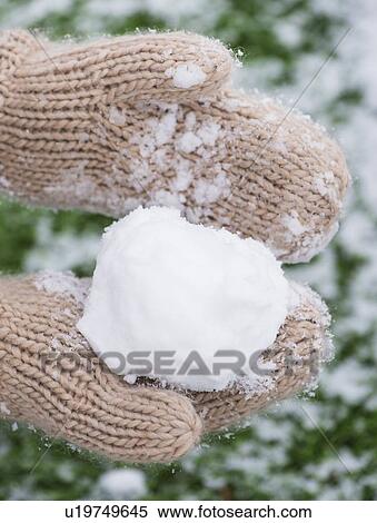 Close-up of snowball and knitted glove View Large Photo Image Stock Photography - Close-up of snowball and knitted glove. Fotosearch