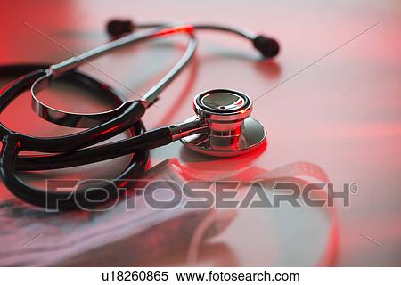 Close up of stethoscope and surgical mask, studio shot View Large Photo Image Stock Photography - Close up of stethoscope and surgical mask, studio shot. Fotosearch