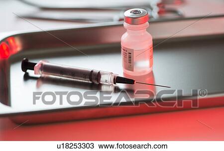 Close up of syringe and medication, studio shot View Large Photo Image Stock Image - Close up of syringe and medication, studio shot. Fotosearch