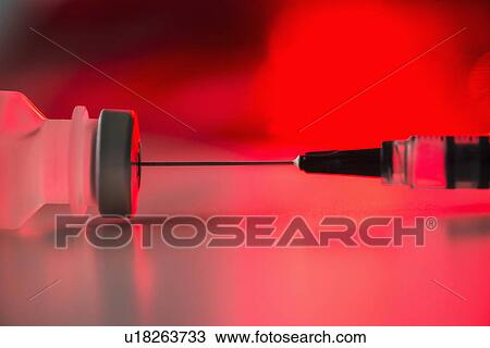Close up of syringe and medication, studio shot View Large Photo Image Stock Image - Close up of syringe and medication, studio shot. Fotosearch