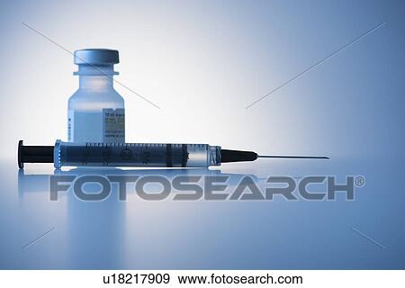 Close up of syringe and medication, studio shot View Large Photo Image Stock Photo - Close up of syringe and medication, studio shot. Fotosearch