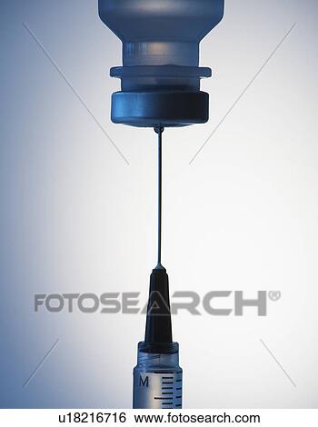 Close up of syringe and medication, studio shot View Large Photo Image Stock Photograph - Close up of syringe and medication, studio shot. Fotosearch