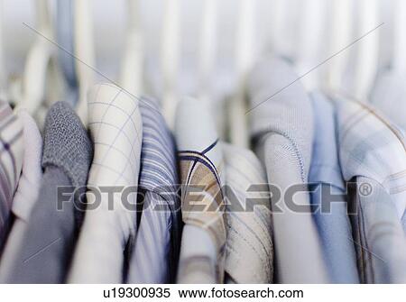 Close-up view of shirts in on rack View Large Photo Image Stock Photography - Close-up view of shirts in on rack. Fotosearch