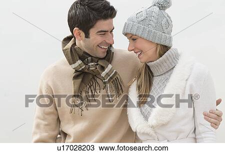 Couple in winter clothing View Large Photo Image Stock Image - Couple in winter clothing. Fotosearch