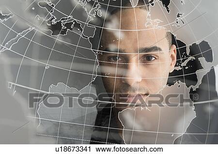 Digital portrait of young man on world map View Large Photo Image Stock Image - Digital portrait of young man on world map. Fotosearch