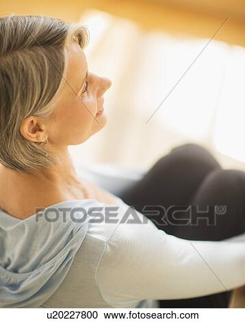 Elevated view of woman relaxing View Large Photo Image Stock Image - Elevated view of woman relaxing. Fotosearch