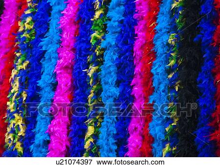 Stock Photo - Feather boas hanging in a row. Fotosearch