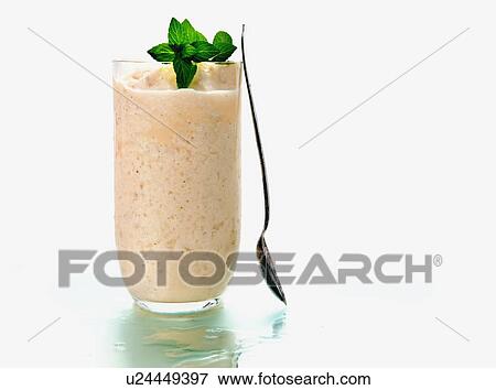 Stock Photo - Fruit smoothie in tall glass. Fotosearch