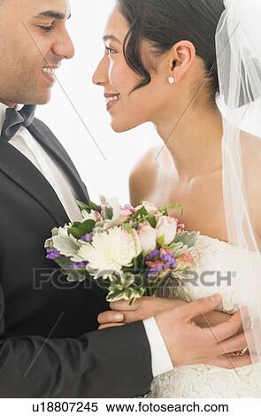 Happy newlywed couple View Large Photo Image Stock Photography - Happy newlywed couple. Fotosearch