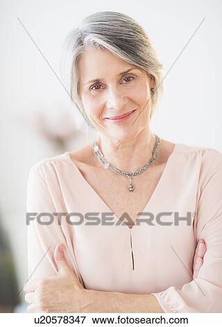 Stock Photo - Portrait of content woman. Fotosearch