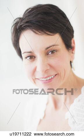 Stock Image - Portrait of mature woman . Fotosearch