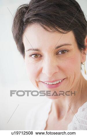 Stock Photo - Portrait of mature woman . Fotosearch