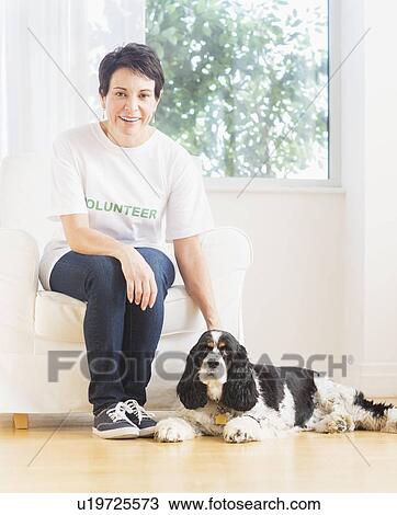 Portrait of mature woman with dog View Large Photo Image Stock Image - Portrait of mature woman with dog. Fotosearch