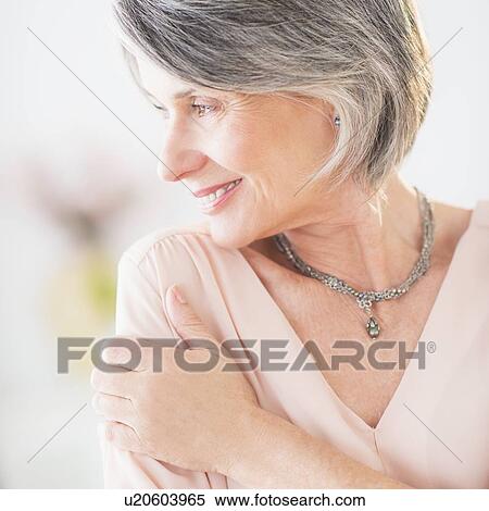 Stock Photography - Portrait of smiling woman. Fotosearch