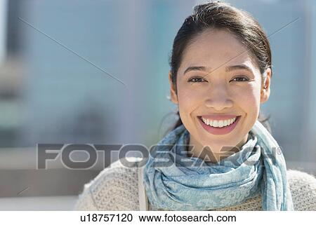 Portrait of smiling young woman View Large Photo Image Stock Image - Portrait of smiling young woman. Fotosearch
