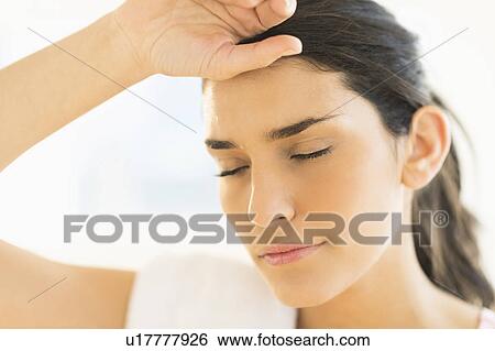 Stock Photograph - Portrait of tired woman. Fotosearch