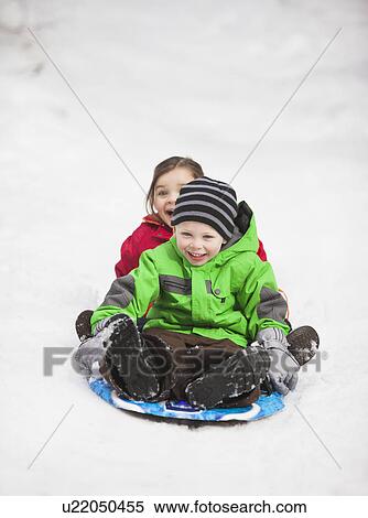Portrait of two sledding children (2-3, 4-5) View Large Photo Image Stock Photography - Portrait of two sledding children (2-3, 4-5). Fotosearch