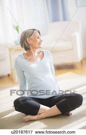Portrait of woman exercising View Large Photo Image Stock Photo - Portrait of woman exercising. Fotosearch