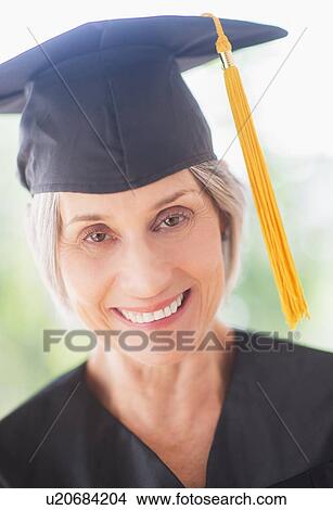 Portrait of woman in graduation cap View Large Photo Image Picture - Portrait of woman in graduation cap. Fotosearch