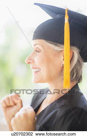 Portrait of woman in graduation cap View Large Photo Image Stock Image - Portrait of woman in graduation cap. Fotosearch