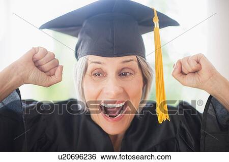 Portrait of woman in graduation cap View Large Photo Image Stock Photograph - Portrait of woman in graduation cap. Fotosearch