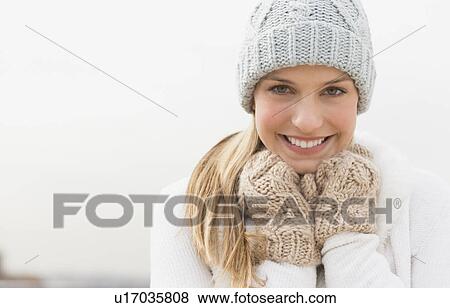 Stock Photo - Portrait of woman in winter clothing. Fotosearch