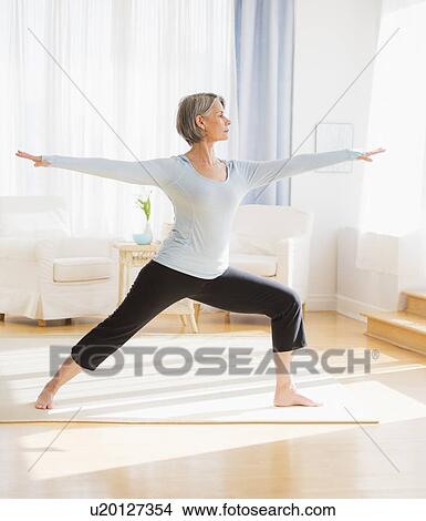 Picture - Portrait of woman practicing yoga. Fotosearch