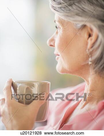 Portrait of woman relaxing View Large Photo Image Stock Photo - Portrait of woman relaxing. Fotosearch