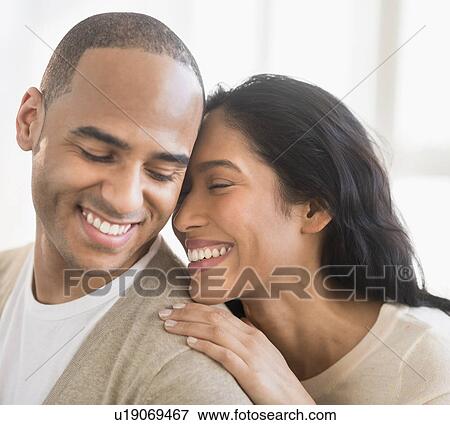 Stock Photo - Portrait of young couple. Fotosearch