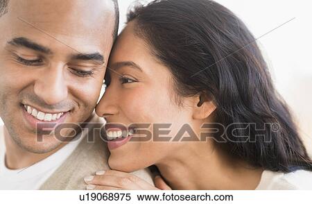 Stock Photography - Portrait of young couple. Fotosearch