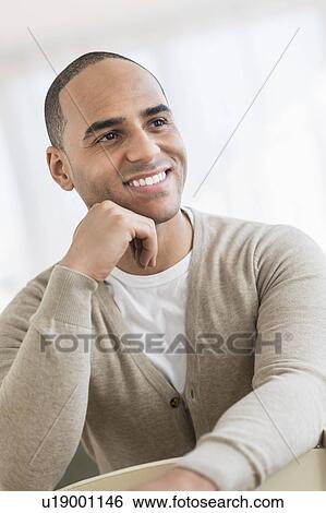 Stock Photograph - Portrait of young man. Fotosearch