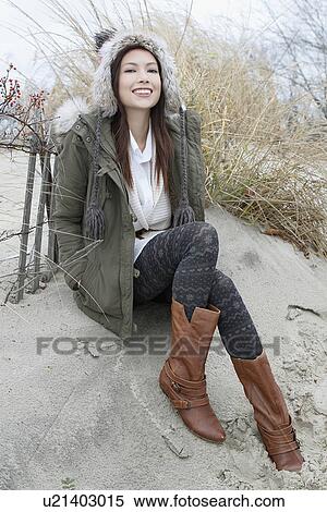 Portrait of young woman in warm clothes View Large Photo Image Stock Photography - Portrait of young woman in warm clothes. Fotosearch