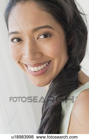 Portrait of young woman View Large Photo Image Stock Photo - Portrait of young woman. Fotosearch
