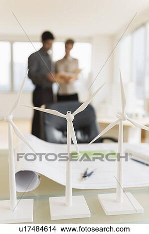 Scale models of wind turbines on office desk View Large Photo Image Picture - Scale models of wind turbines on office desk. Fotosearch