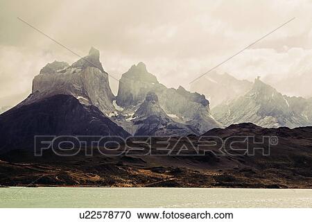 Scenic view of mountain range at sunrise View Large Photo Image Stock Image - Scenic view of mountain range at sunrise. Fotosearch