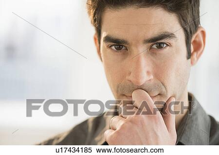 Studio portrait of mid adult man View Large Photo Image Stock Photography - Studio portrait of mid adult man. Fotosearch
