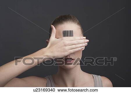 Studio portrait of woman with bar code on forehead View Large Photo Image Stock Image - Studio portrait of woman with bar code on forehead. Fotosearch