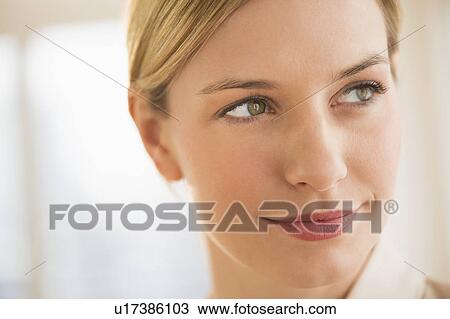 Studio portrait of young woman View Large Photo Image Stock Image - Studio portrait of young woman. Fotosearch