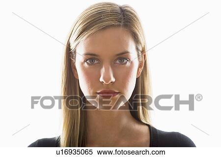 Stock Photography - Studio portrait of young woman. Fotosearch